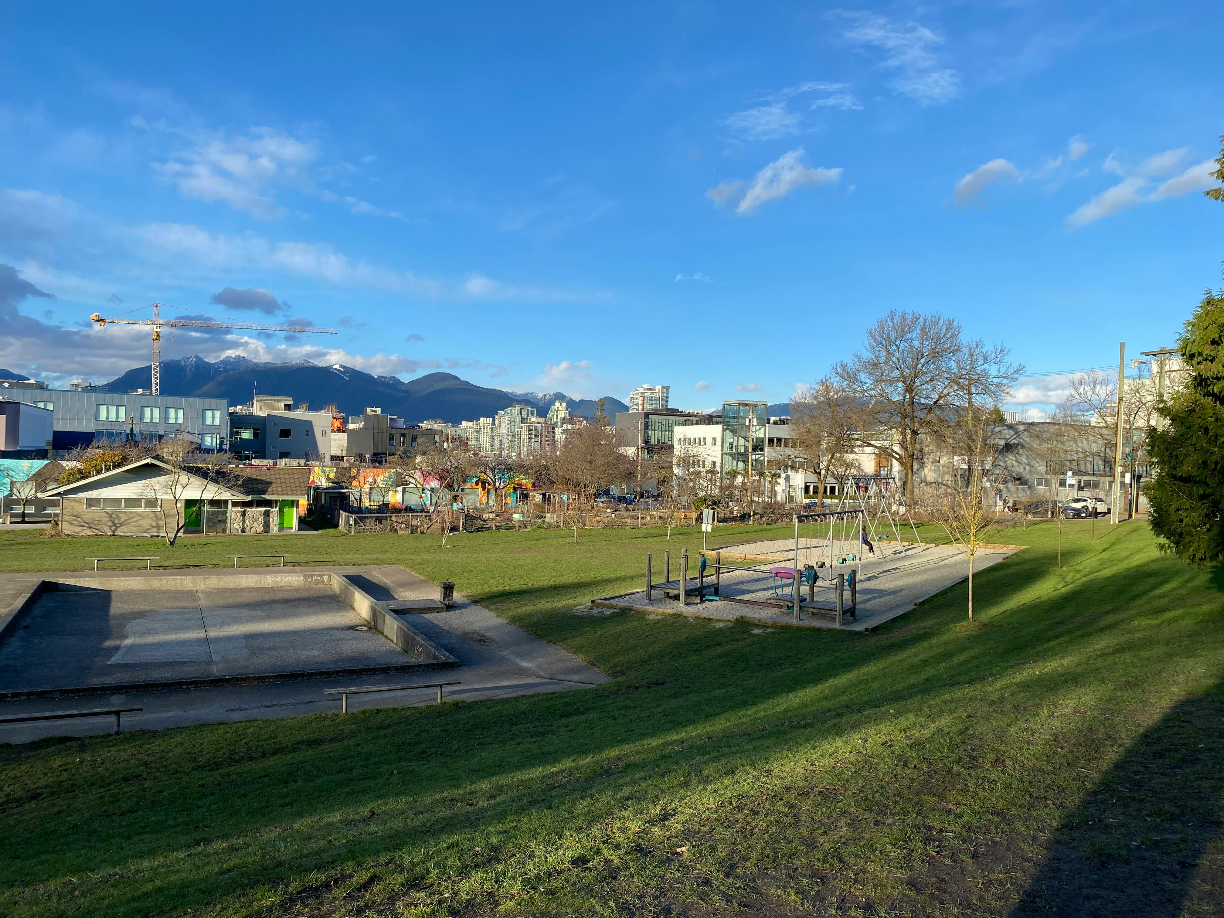 Out-of-service concrete wading pool and outdated playground