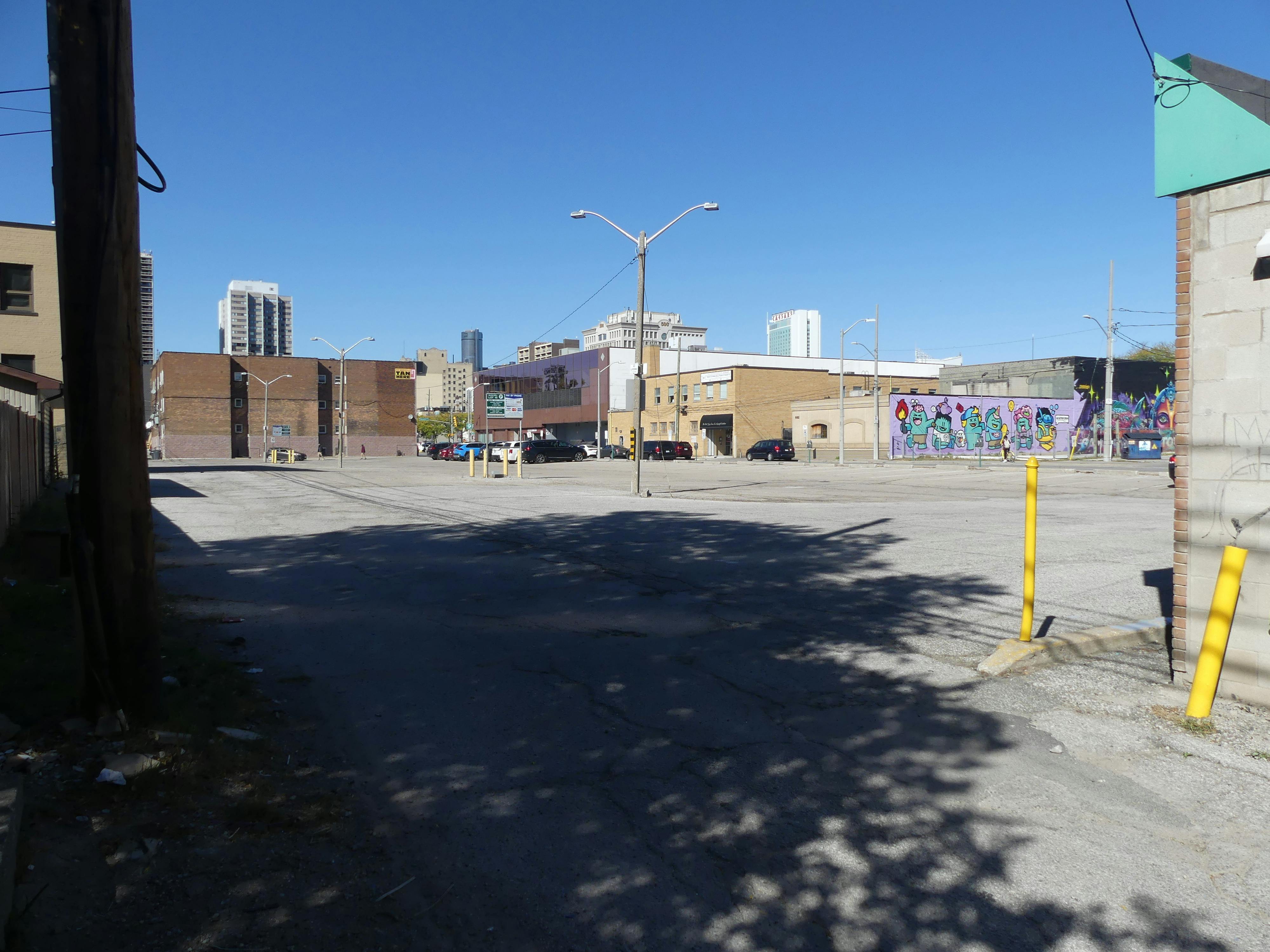 Alley view of North side of Pelissier Street Parking lot.