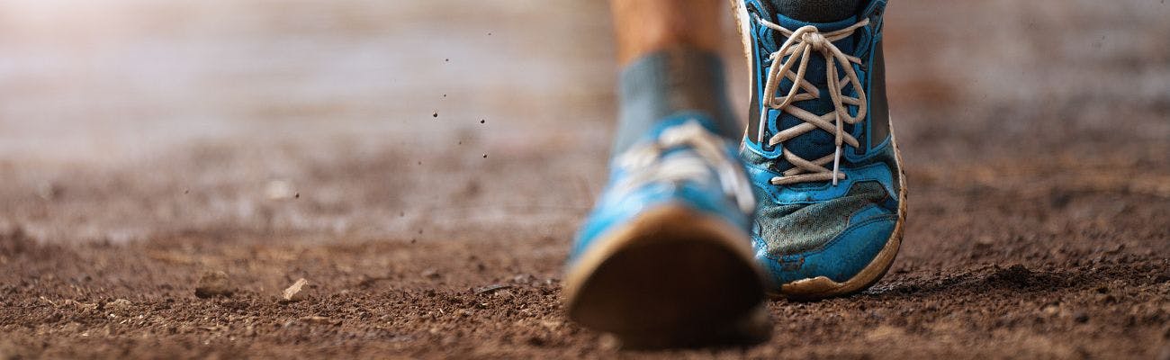 Running shoes walking on trial