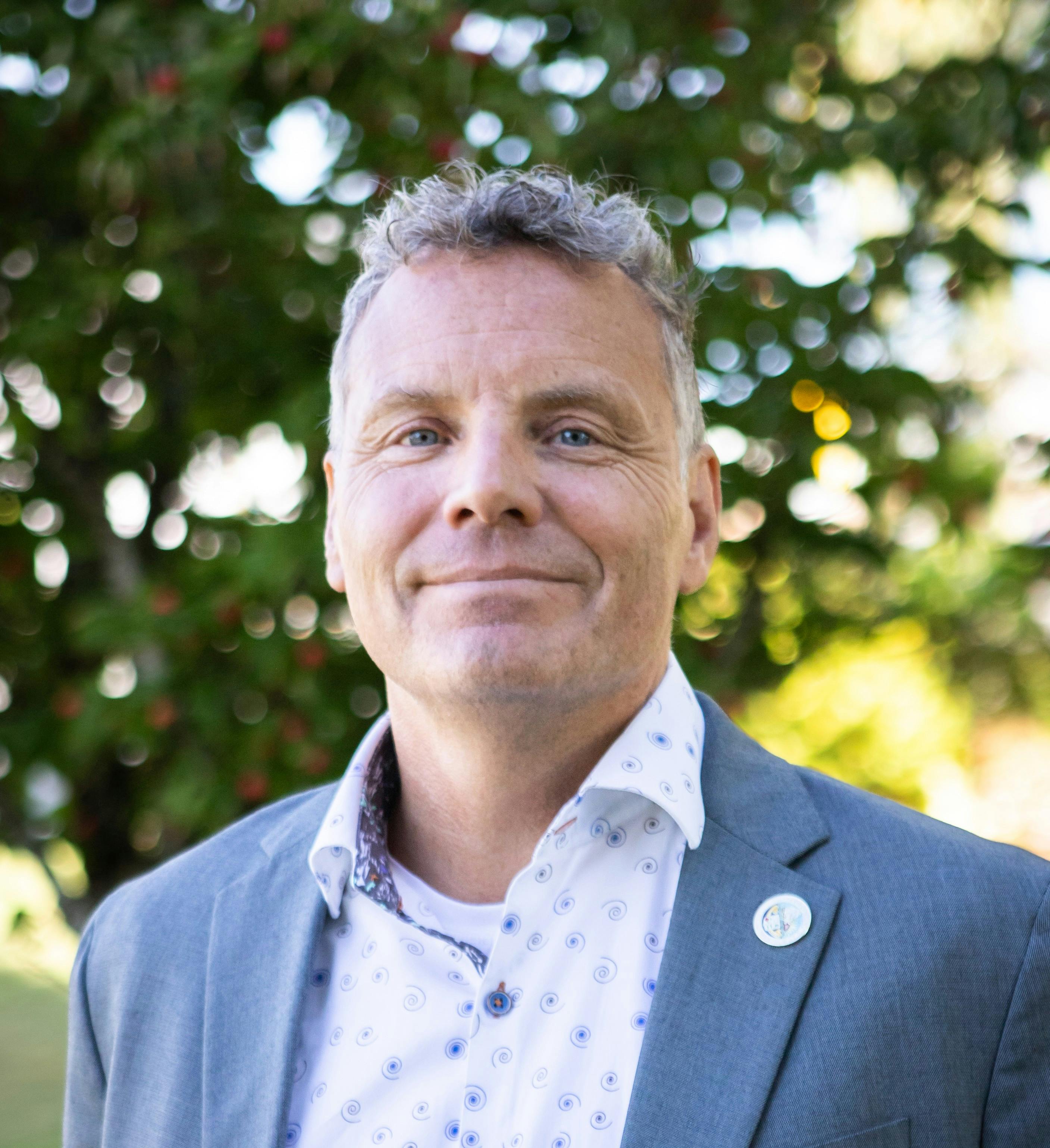 Team member, Mike Fox (he/him)