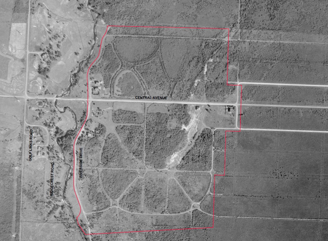 An aerial photo shows the Central Avenue site in 1927 before significant development occurred.