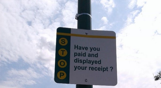 Directional Paid Parking Signage 
