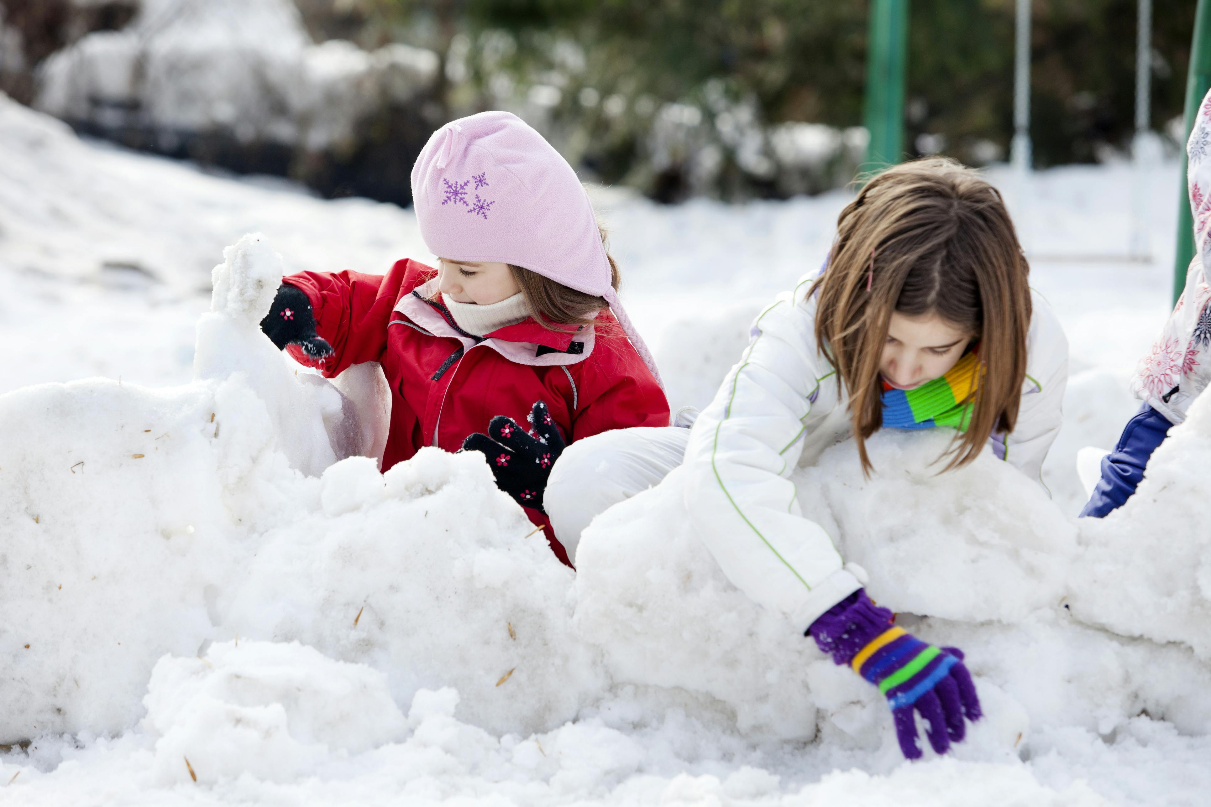 Kids building in the snow