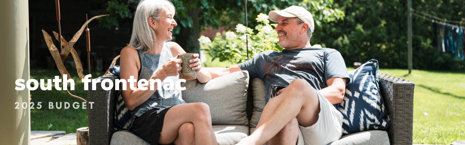 male and female sitting, laughing and talking