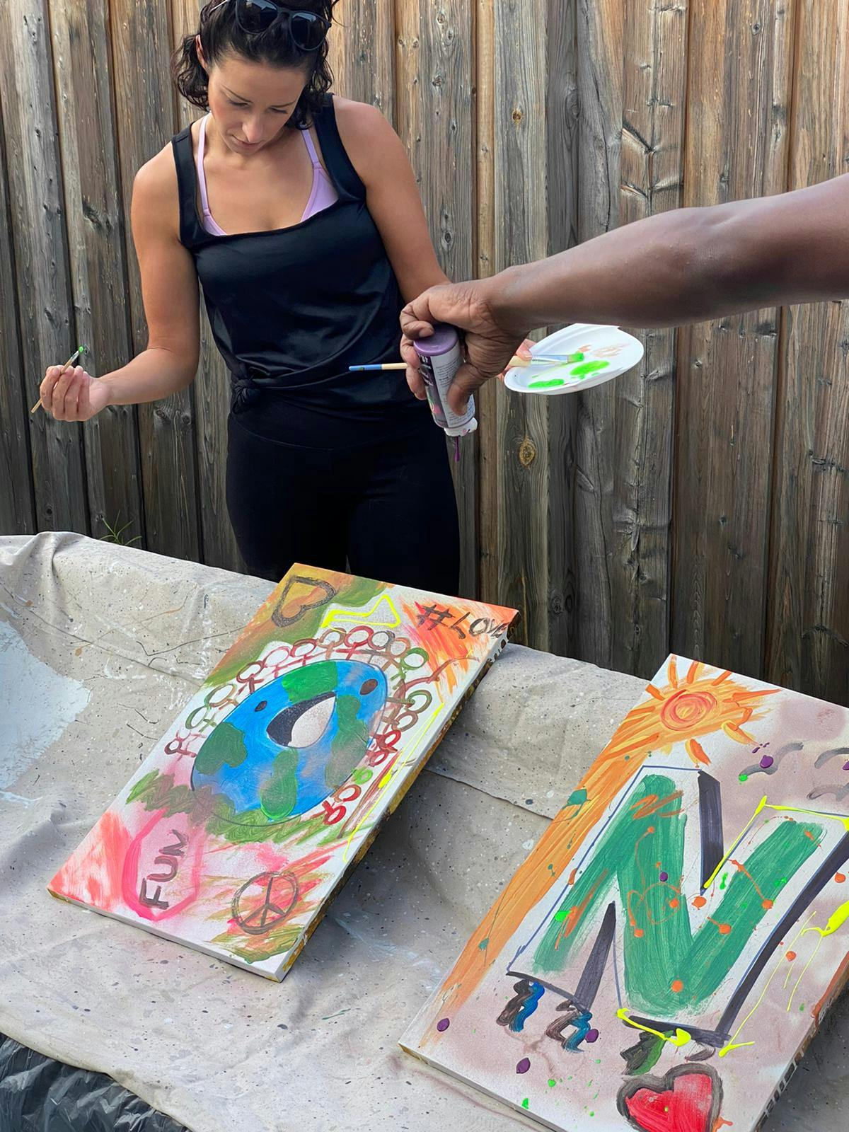 Participant looking at two canvases with the letters "O" and "N." 