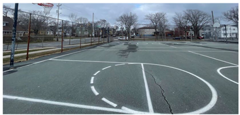 A photo of the current basketball court at Highland Park Jr. High School