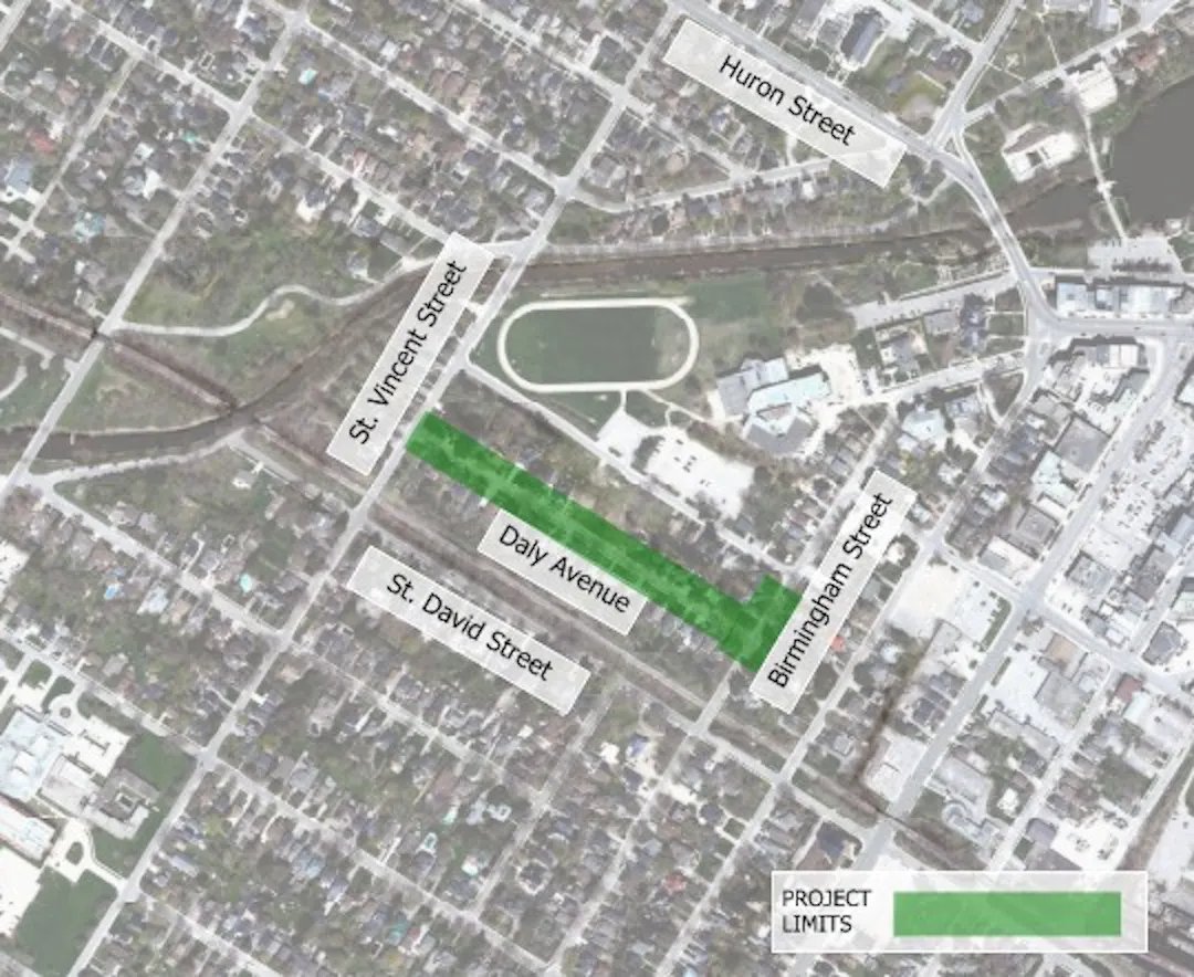 A aerial photo of the project site. The project limits are highlighted in green.