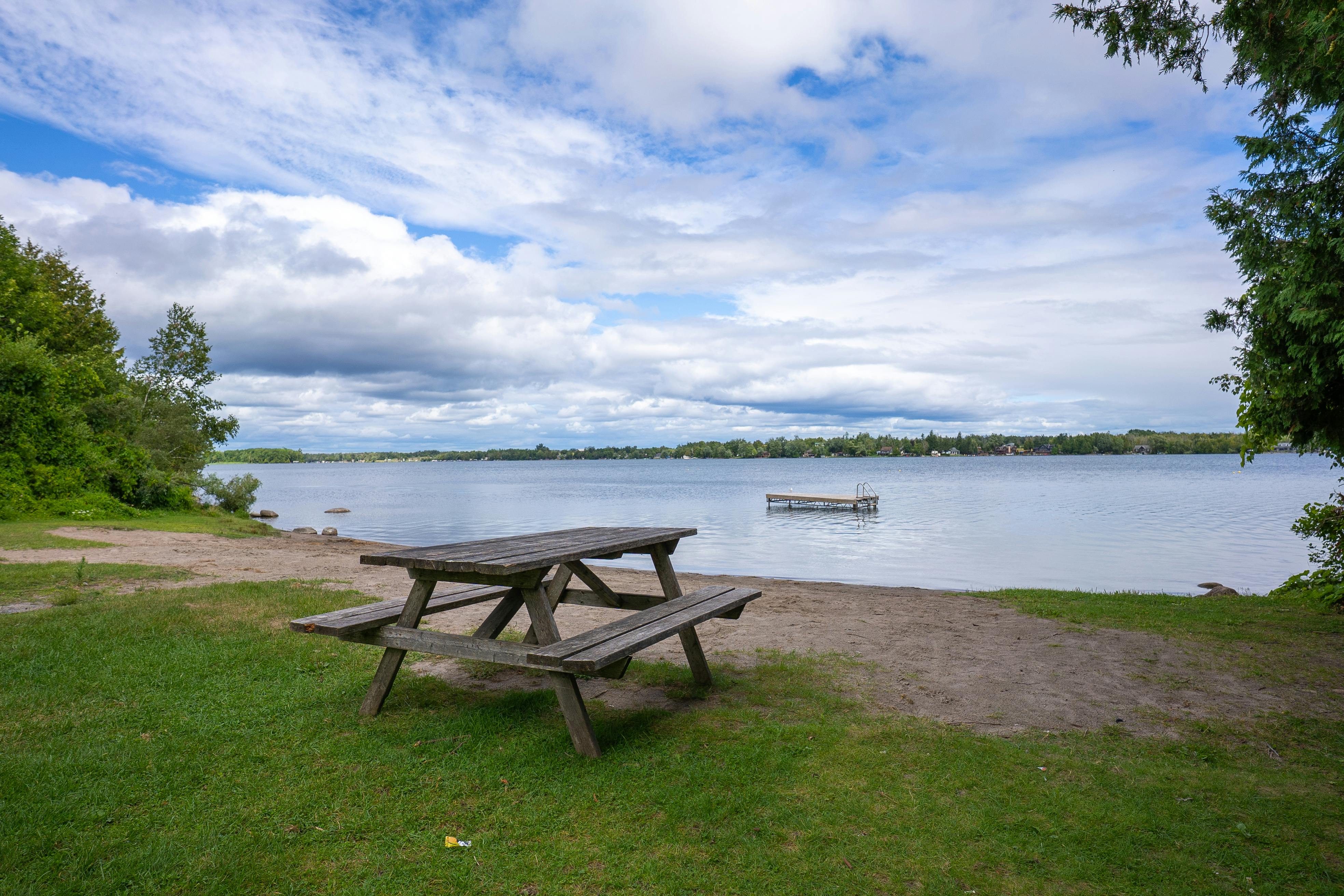 Photo of picnic table at beach at the Ennismore Waterfront Park and Beach