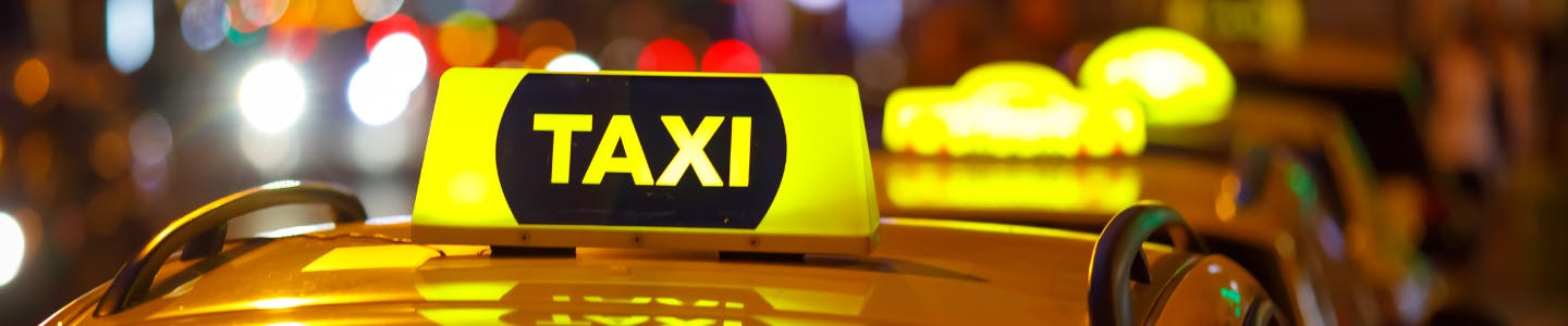 taxi sign on car roof