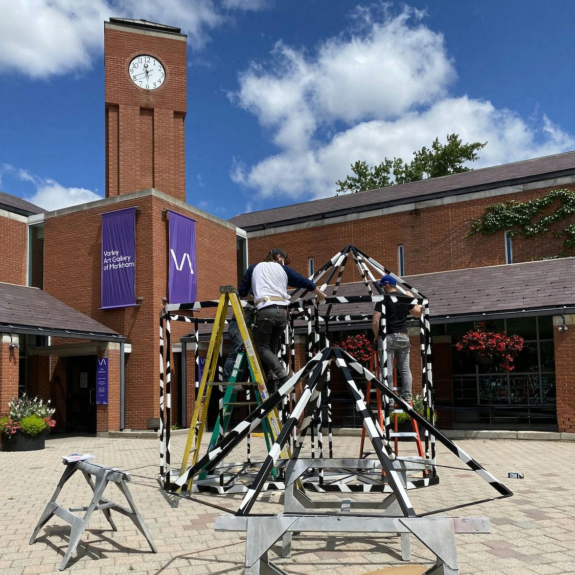 Behind the scenes of installation day. Photo by Yan Wu.