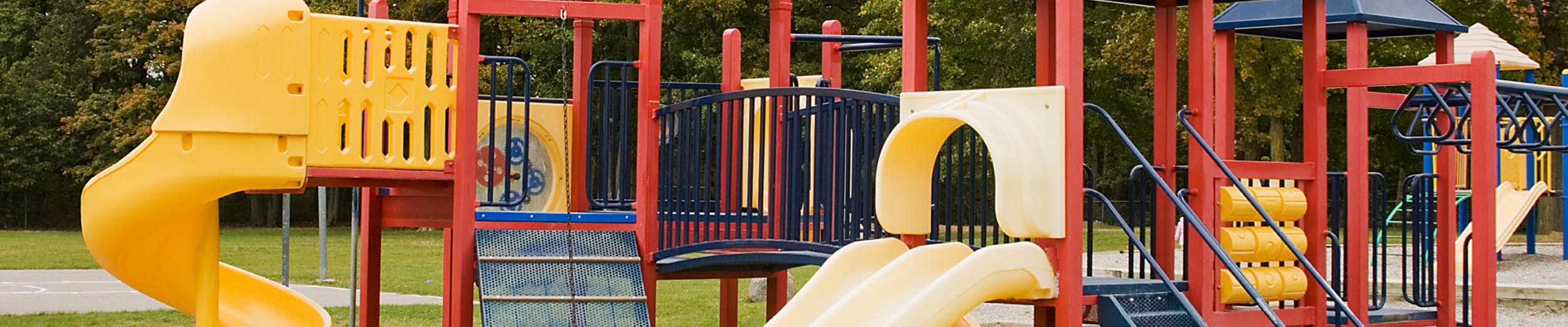 Playground with slides, covered structures and interactive features.