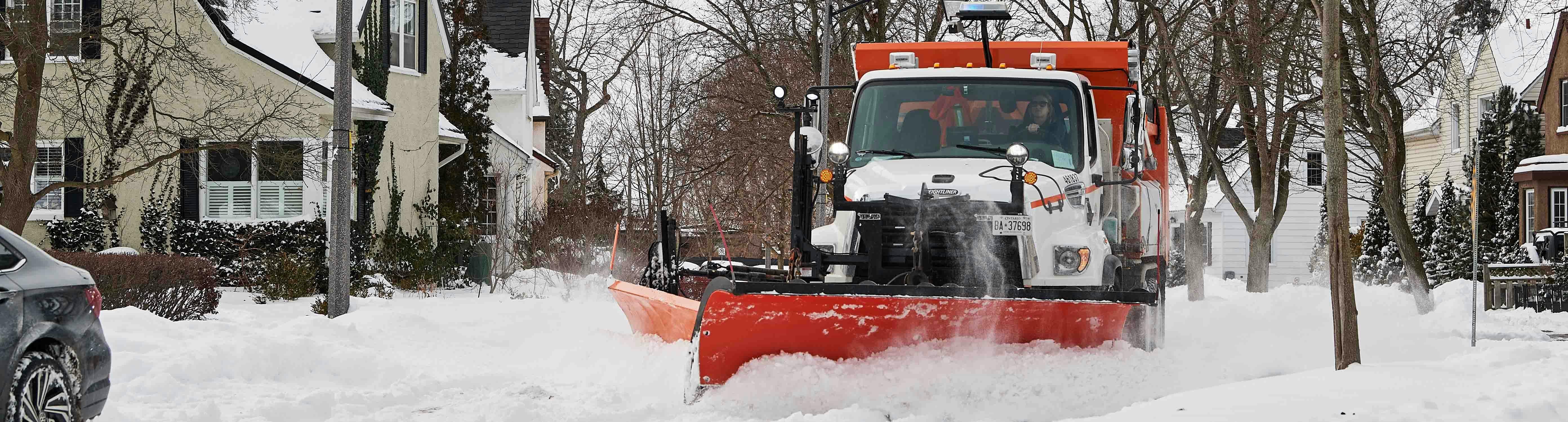 A City of Brantford snowplow clearing streets of snow