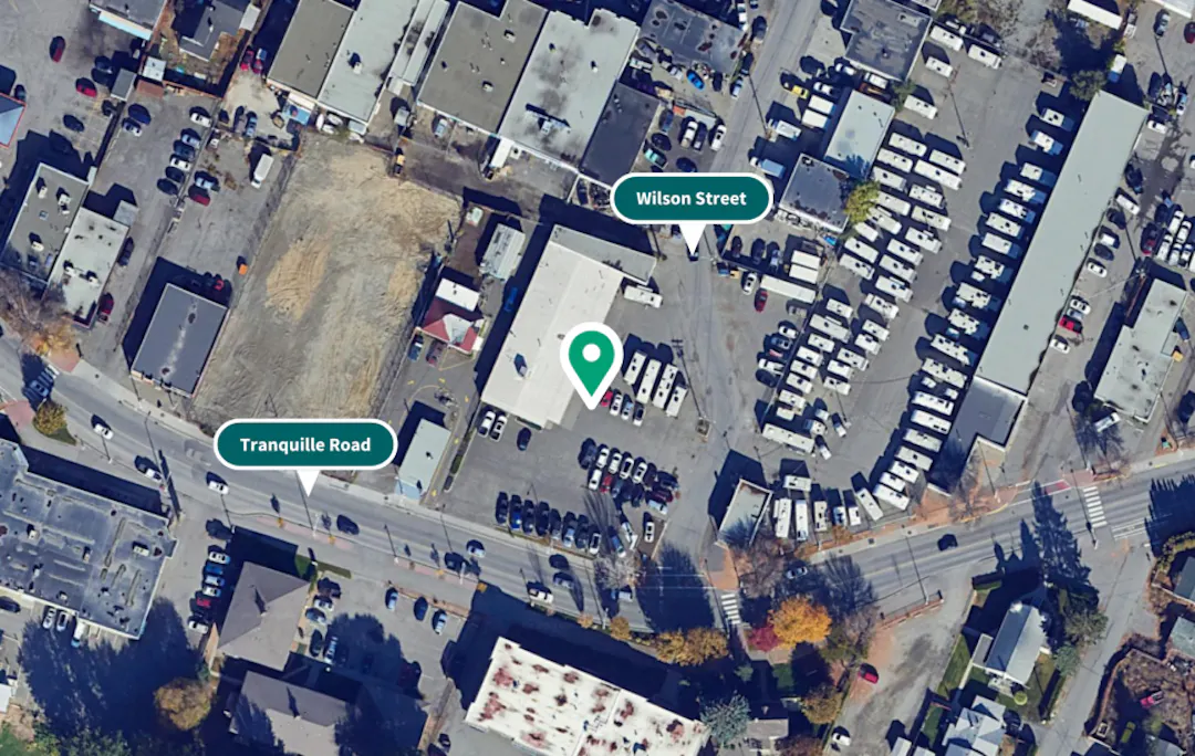 Aerial view of a BC Housing project site outlined in red, located near Tranquille Road and Wilson Street.