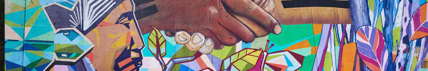 A colourful wall mural representing Indigenous relationships and reconciliation