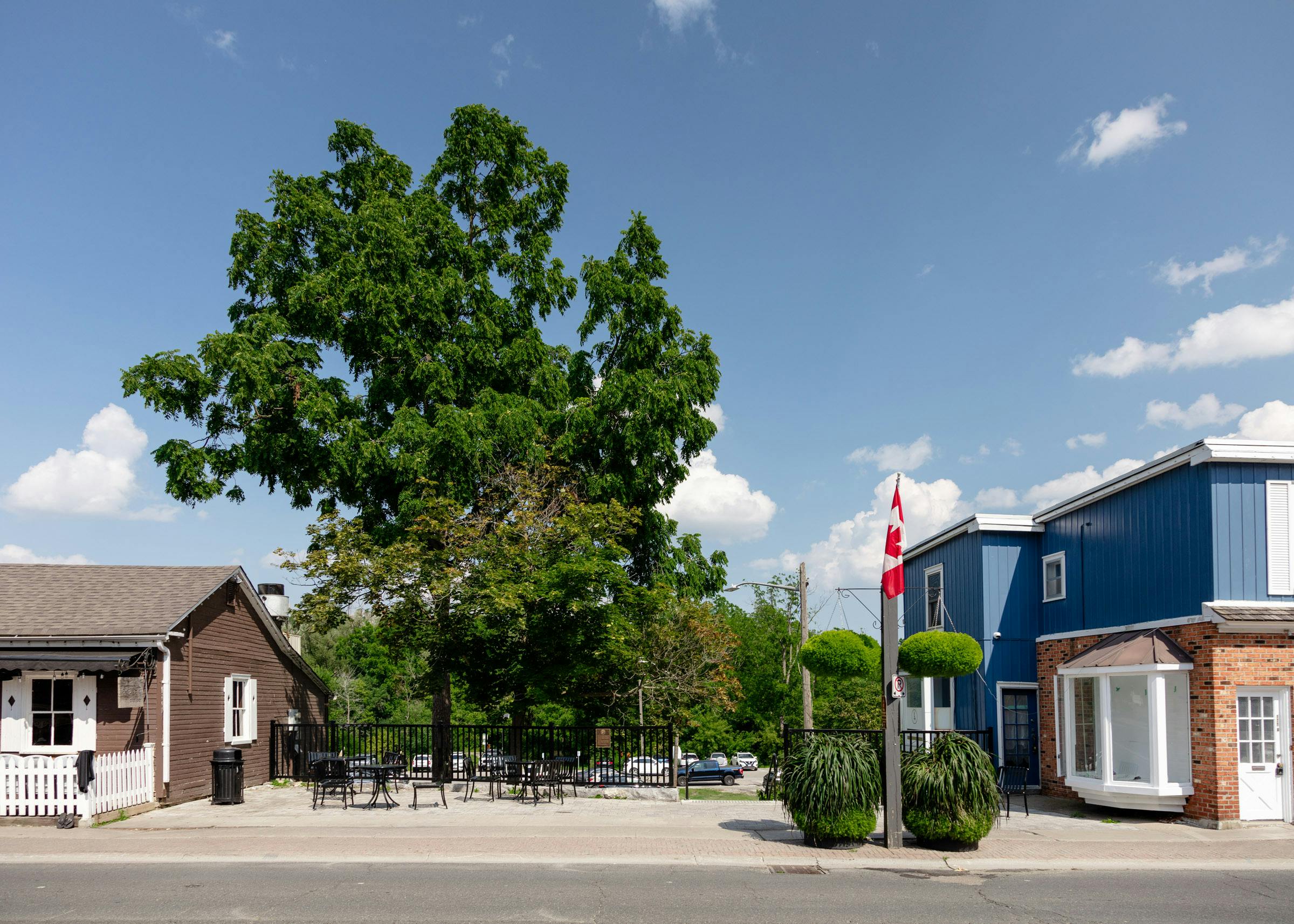 Plaza - The small plaza on the east side of Main Street Unionville, with stairs leading down to    a parking lot and the pathway to the Rouge Trail (Opportunity 2). Photo by Laura Findlay.