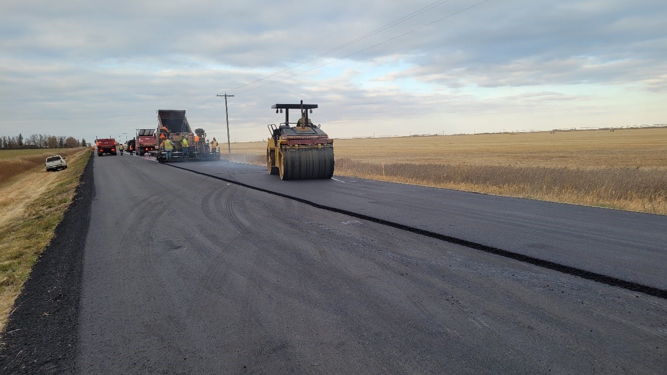 Crews paving Broxburn Road