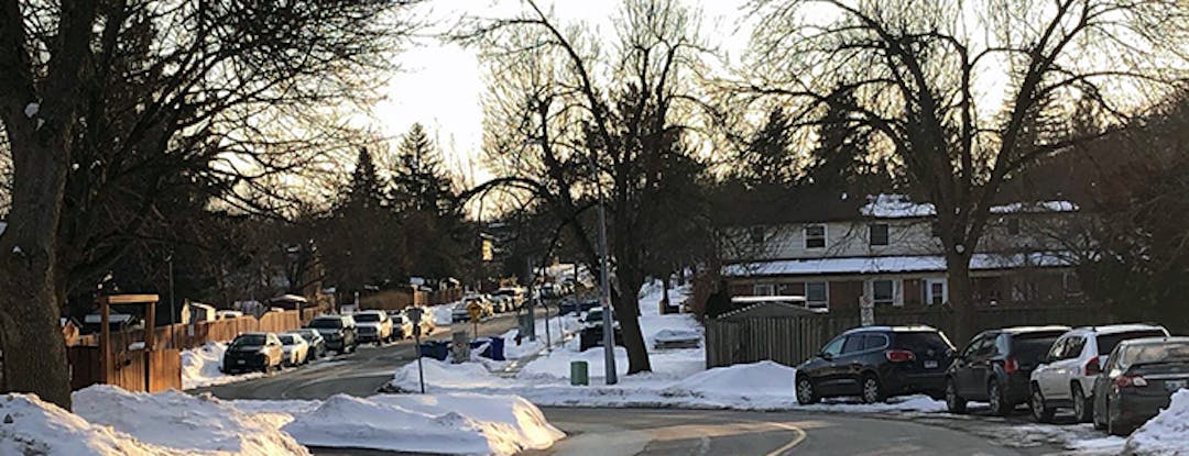 Vehicles parking on-street.