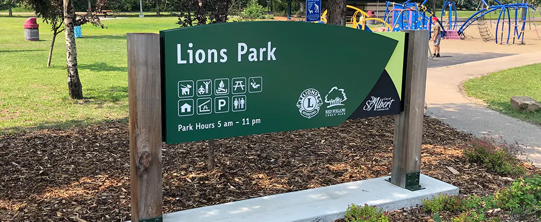 Lion Park sign with the park in the background