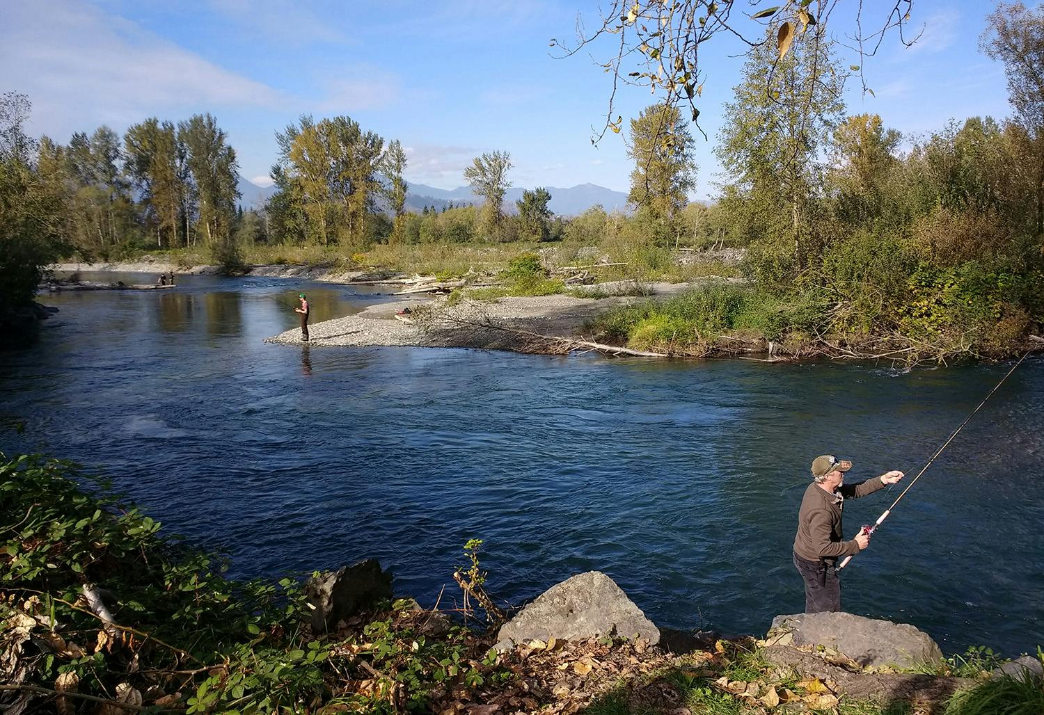 Two people fish in the Vedder River