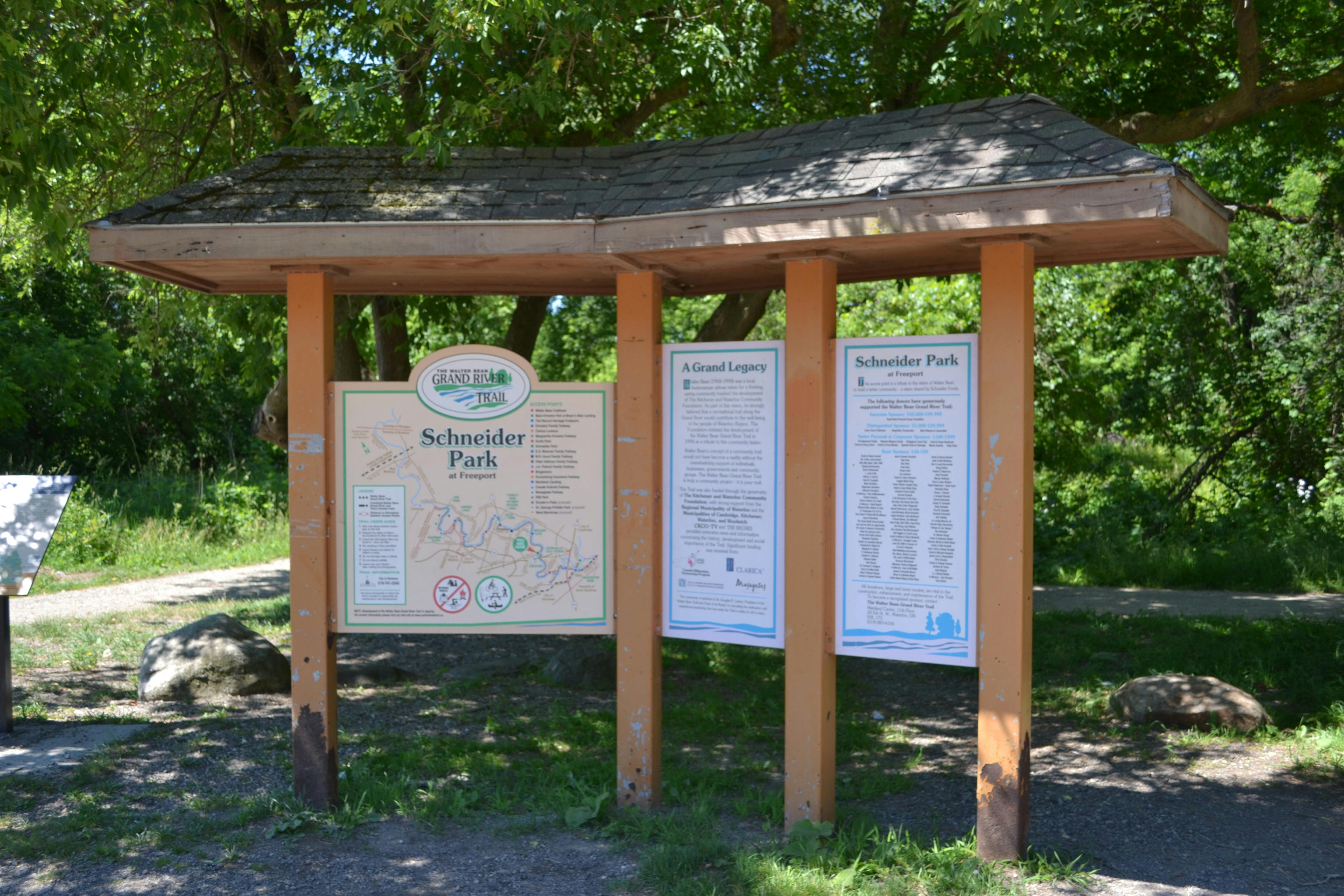 Signage in the adjacent Schneider Park
