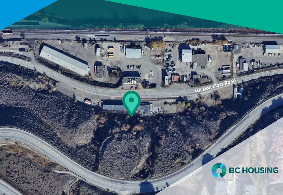 aerial view of an industrial area along Mission Flats Road. Various buildings and structures are visible