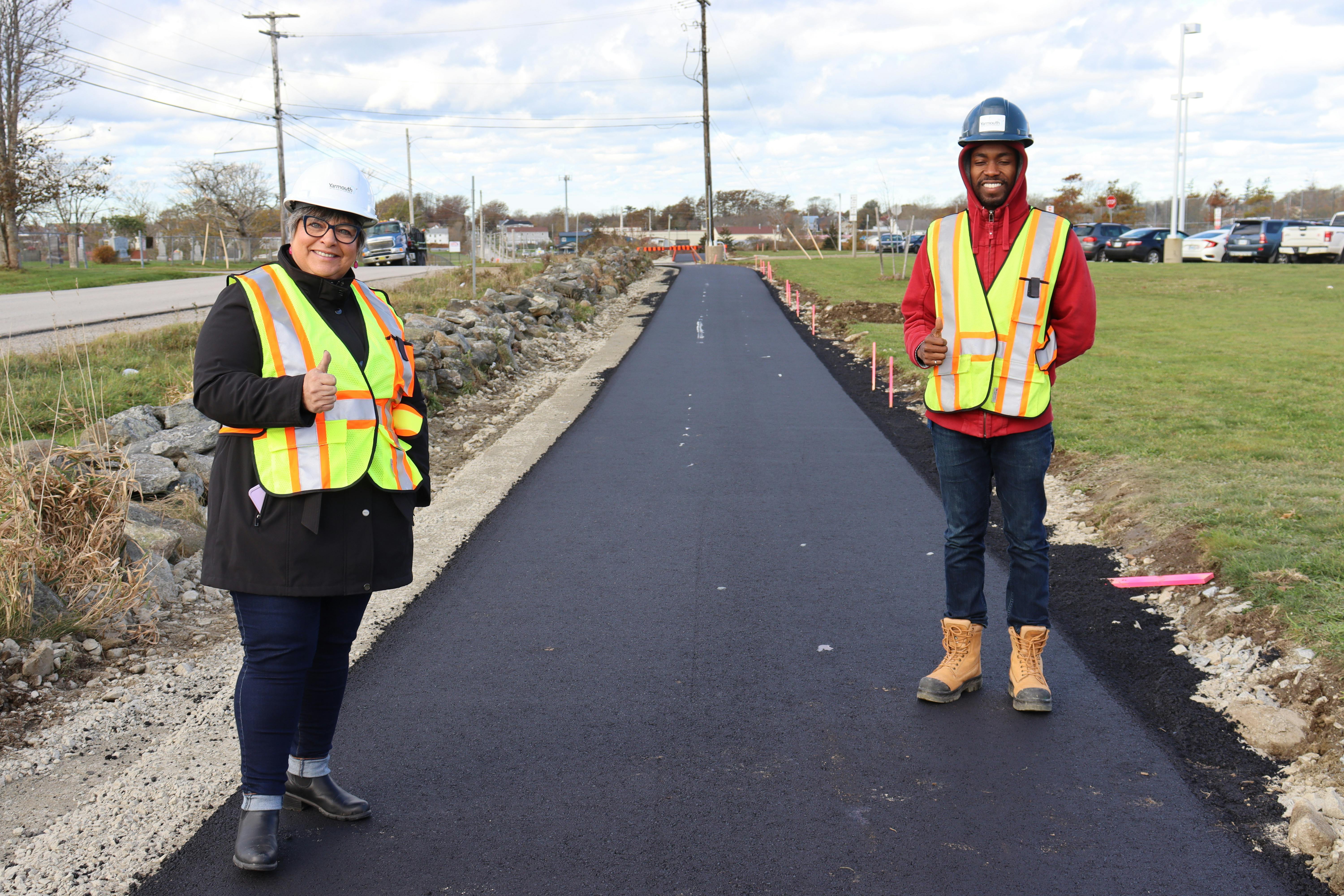 Mayor Mood and Project Engineer DeMario Dunkley inpsecting the new trail on Forest Street.