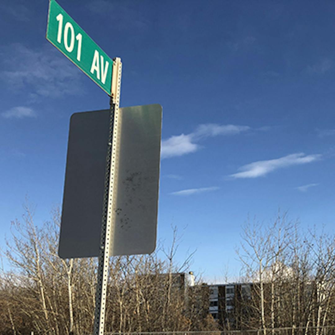 Image of a street sign showing 101 Avenue