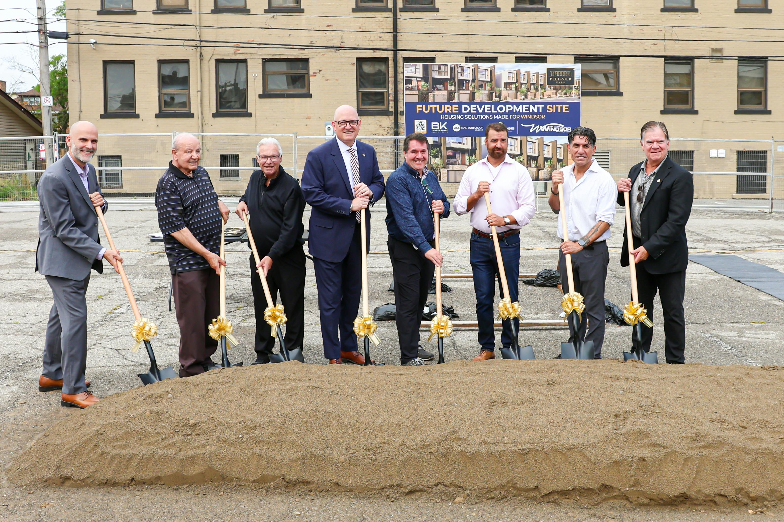 The Mayor, City administration, members of City Council and Pelissier Park Ltd. gathered for a photo at the groundbreaking media event