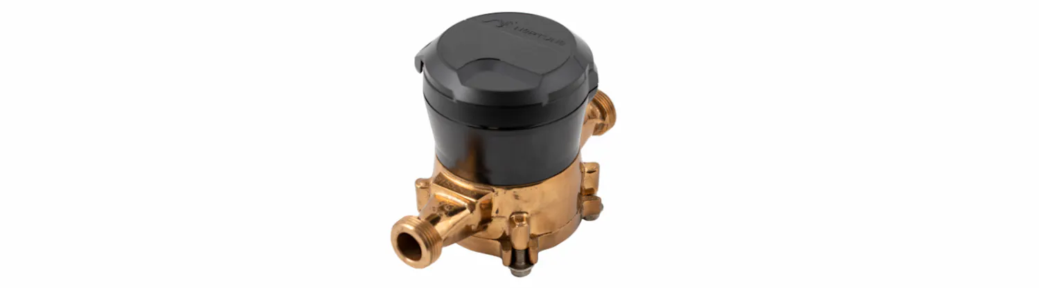 A gold and black water meter