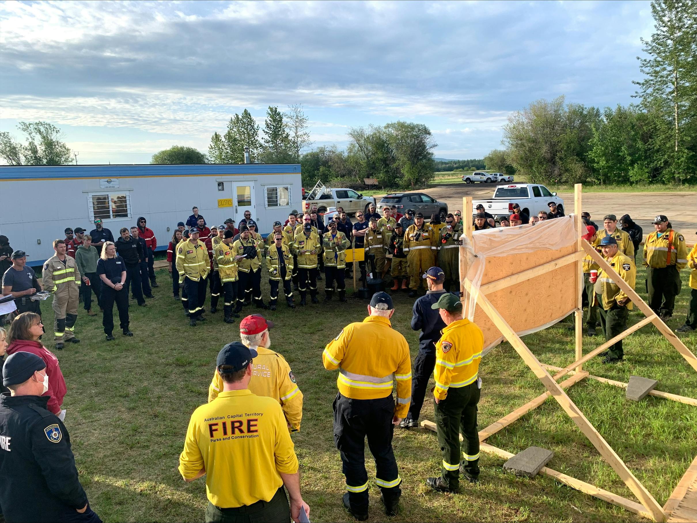 Australia, New Zealand, Alberta and USA teams during safety briefing