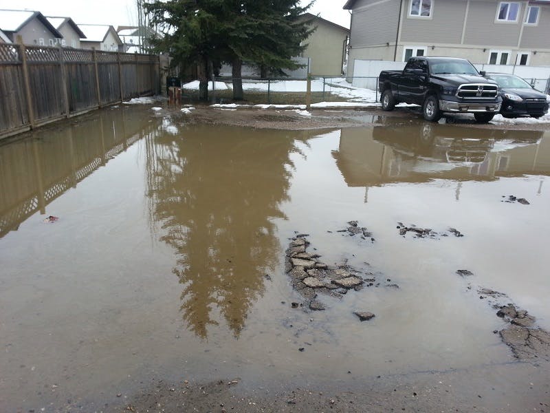 Parking Lot Flood onto Neighbouring Properties