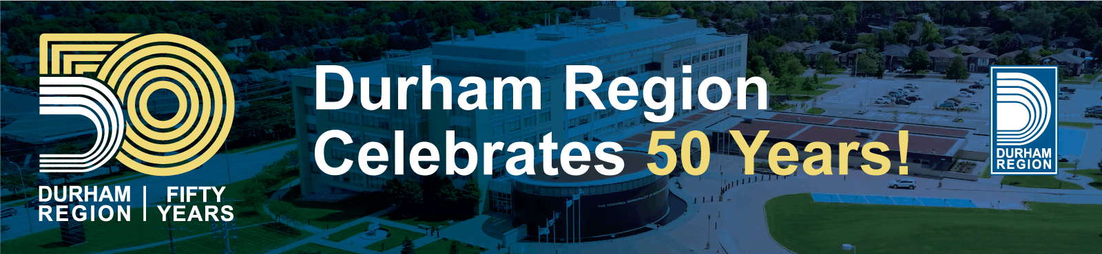 An aerial view of the Region of Durham headquarters with text that reads “Durham Region Celebrates 50 Years!"