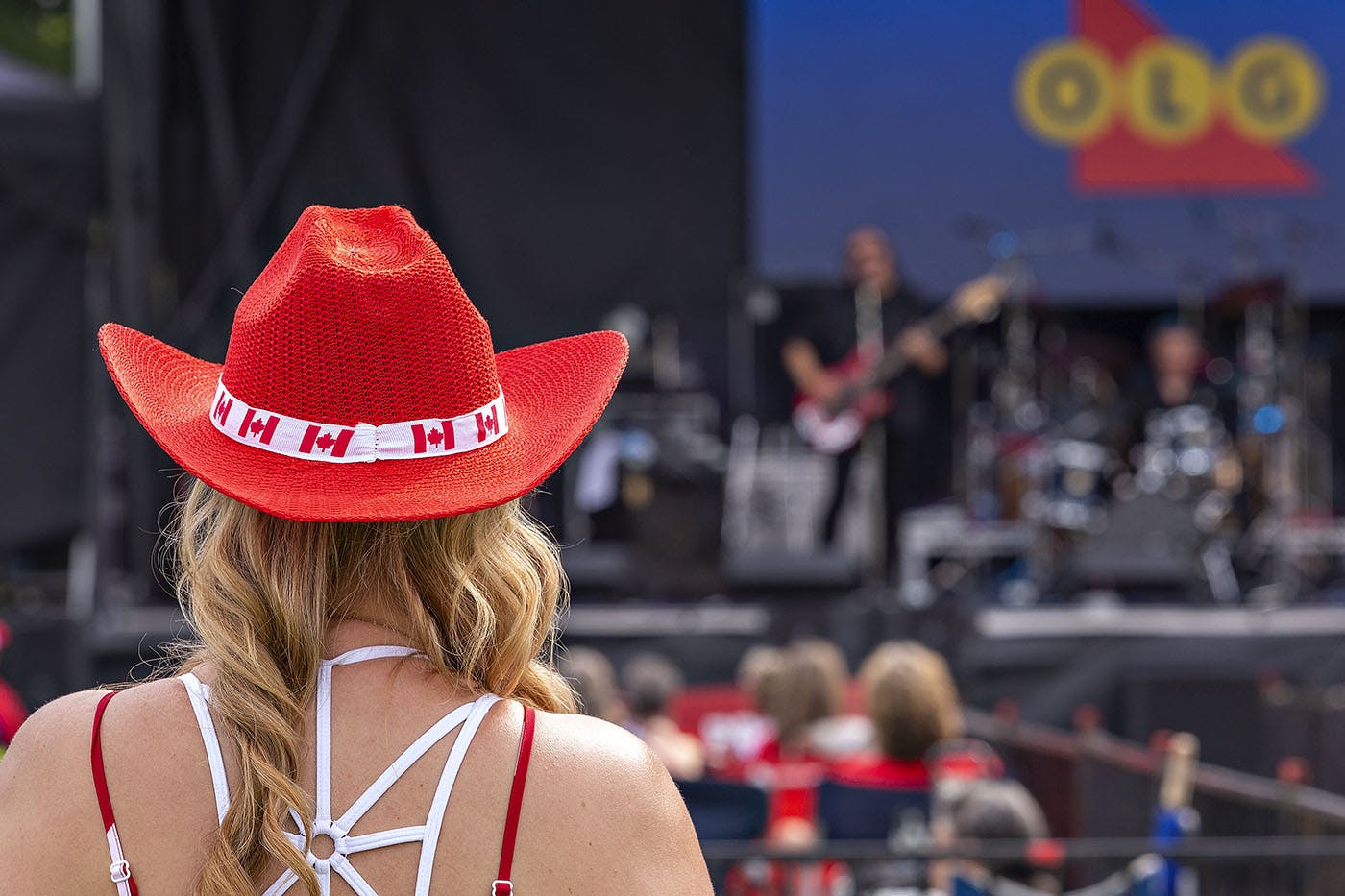 Person wearing Canada Day hat.jpg