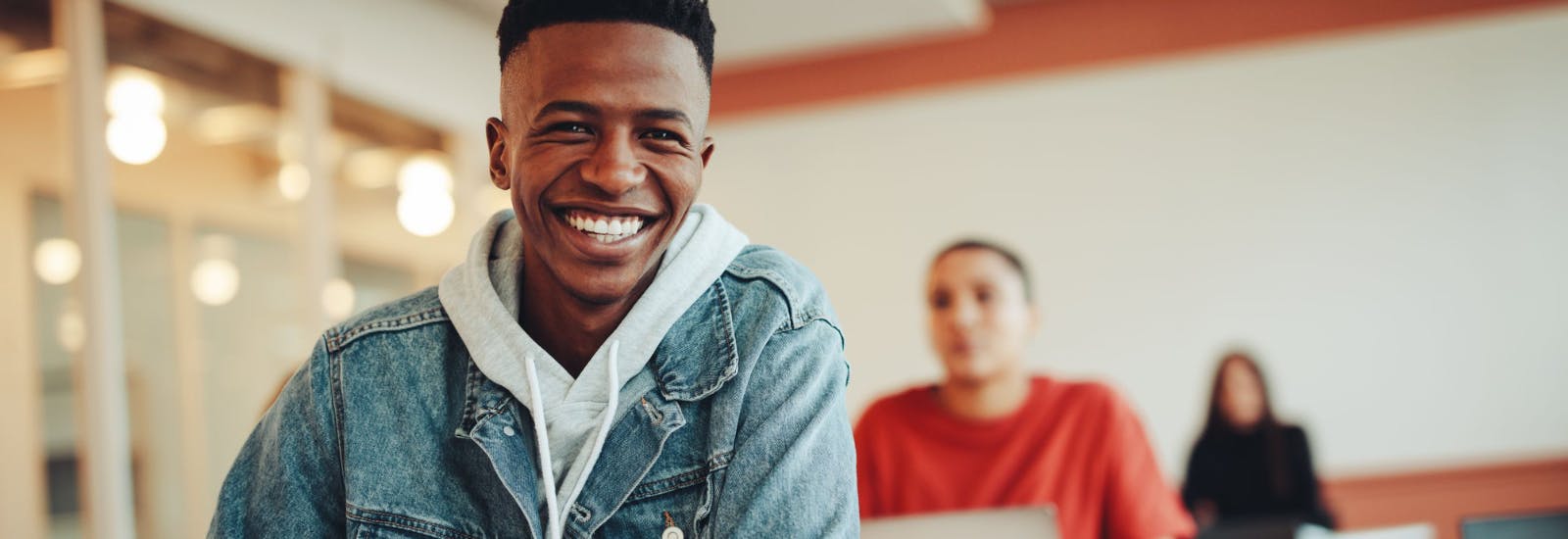 A Black student sitting in class