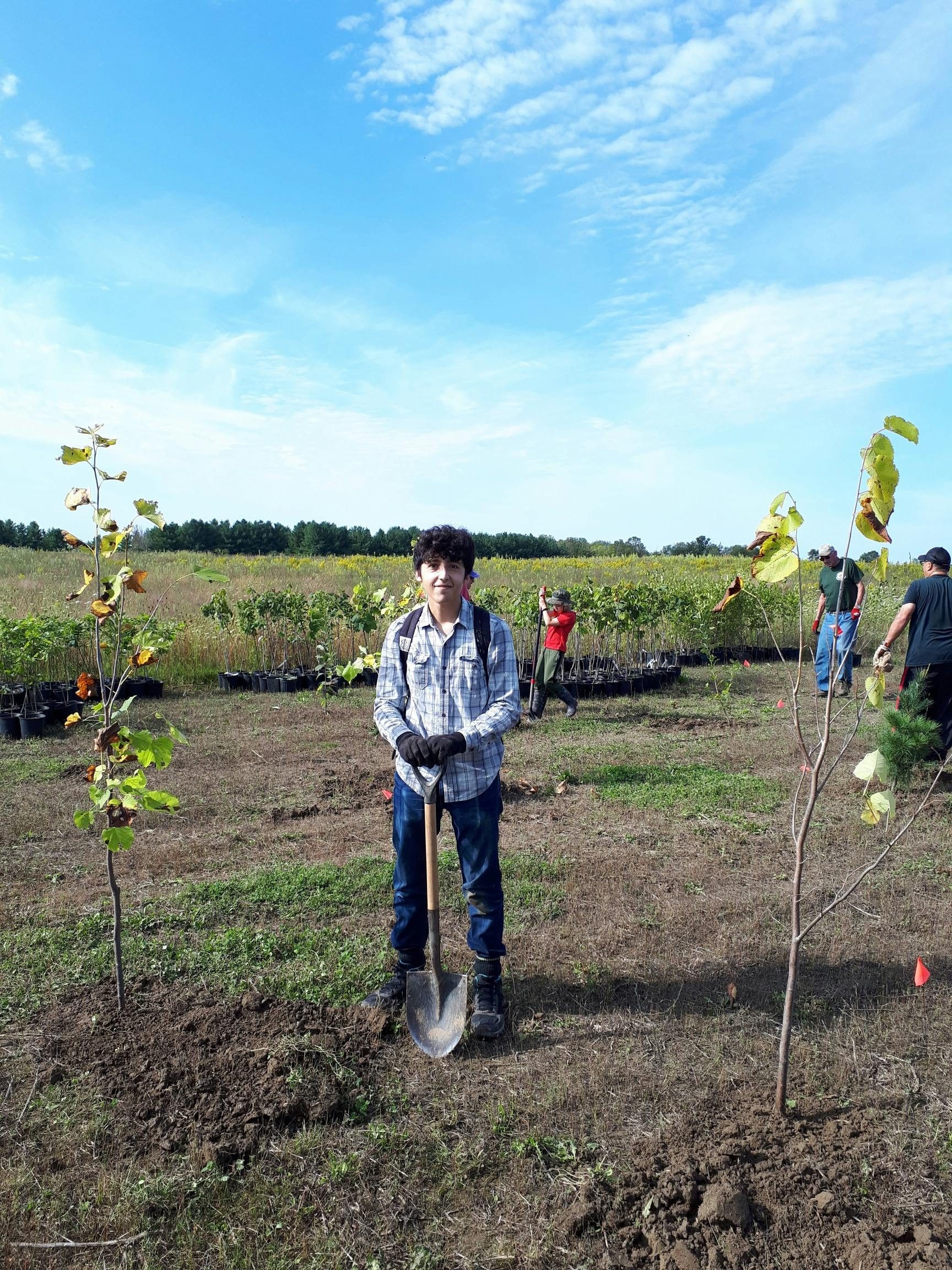 David planting a tree.jpg