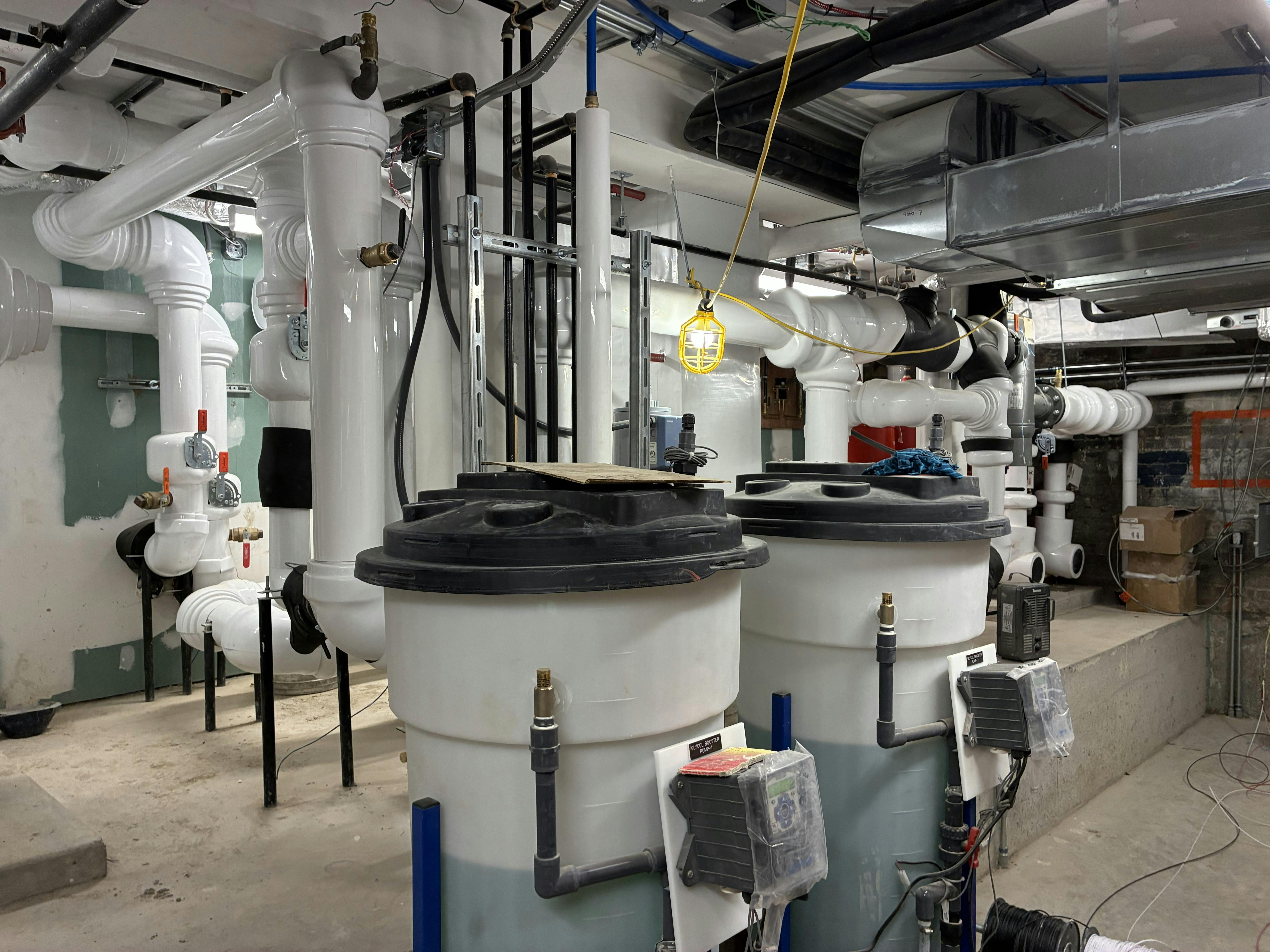 Geothermal pump system and heat exchangers in the Mulock House basement