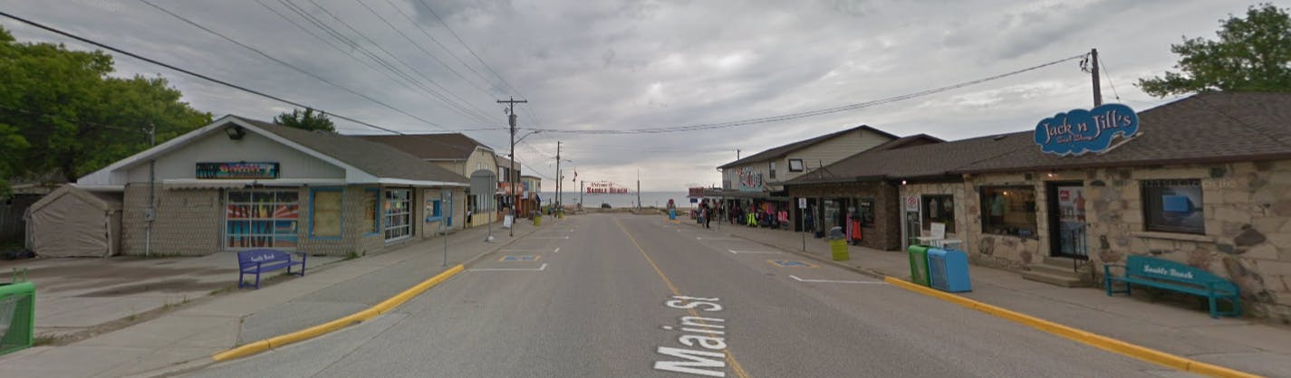 Google Streetview image of Sauble Beach Main Street, facing west towards the water from Second Ave.  Image courtesy of Google Maps