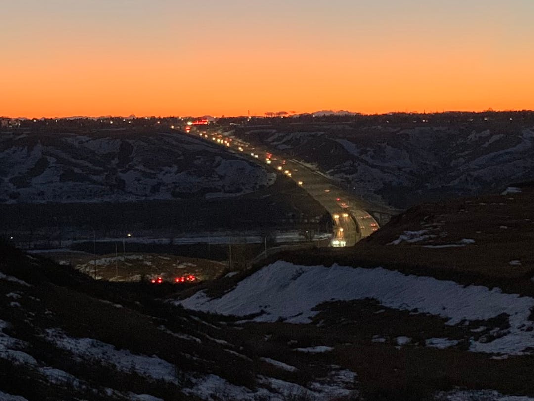 View of Whoop Up Drive at Sunset from next to the Galt Museum