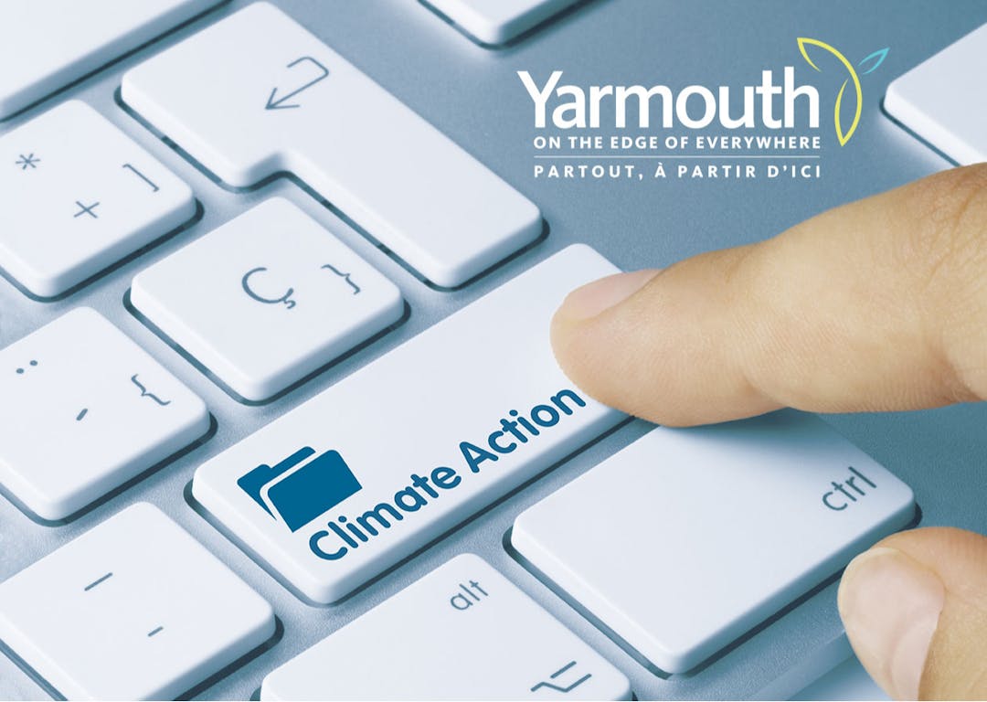 Keyboard image with an enter button that says "Climate Action" with a finger about to press it.