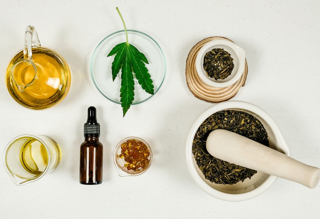 Cannabis leaf with various cannabis products. 