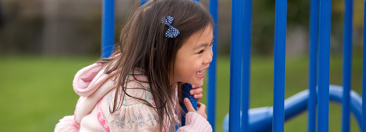 Girl playing on a playground