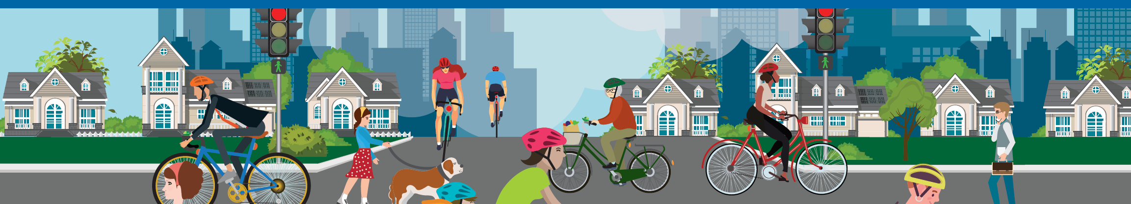 A busy street with many cyclists of various age groups