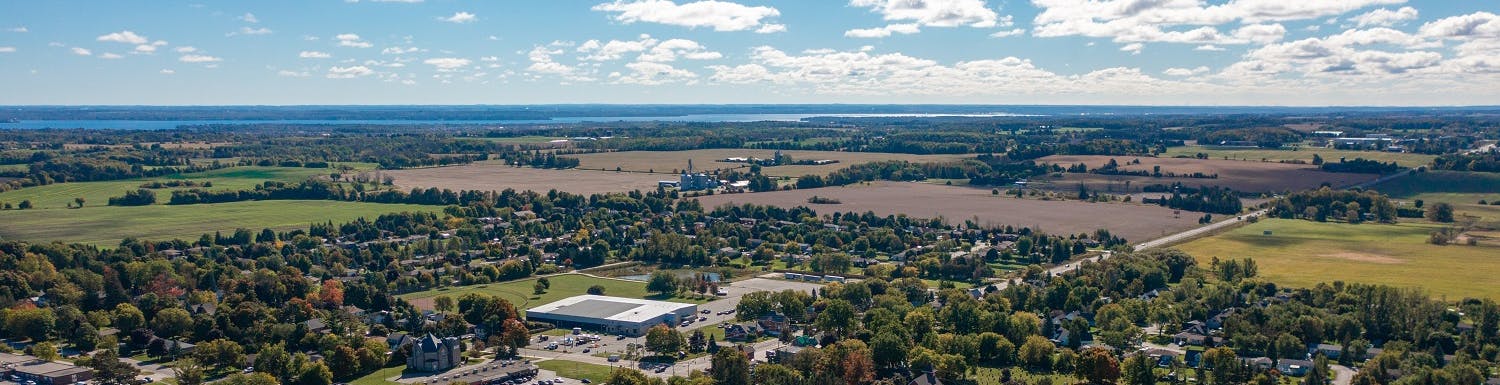 Aerial view of Innisfil houses and farmland