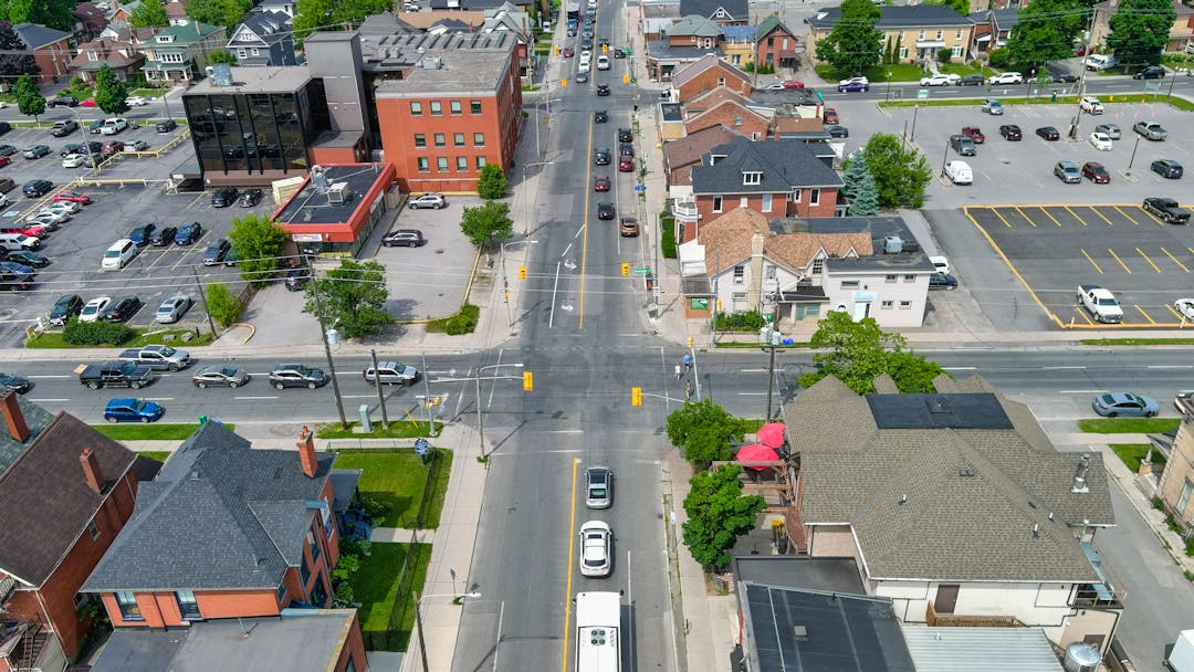 An aerial image of Charlotte Street from Stewart Street looking west. Cars, pedestrians