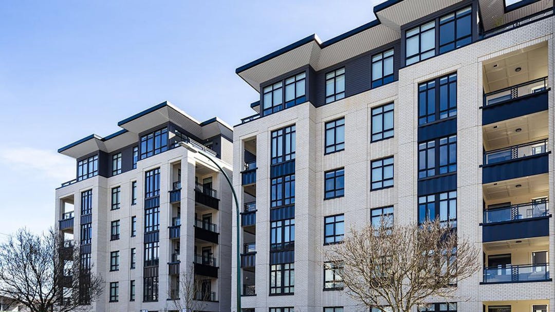 A new six story apartment building in Vancouver featuring a clean, modern design. 