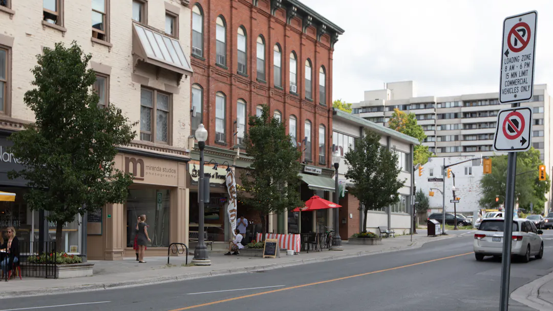 View of a City of Peterborough Street with a parking sign