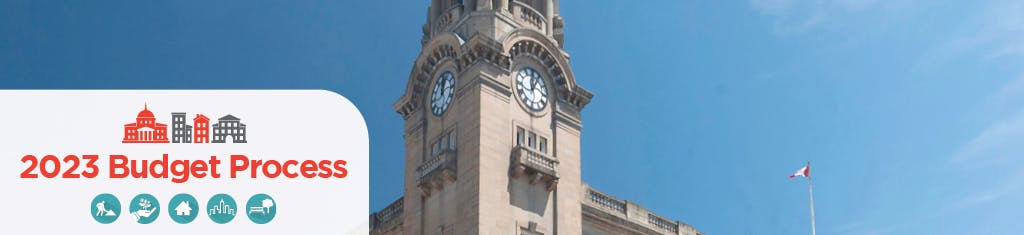 City Hall clocktower with the text 2023 Budget Process and infographics 