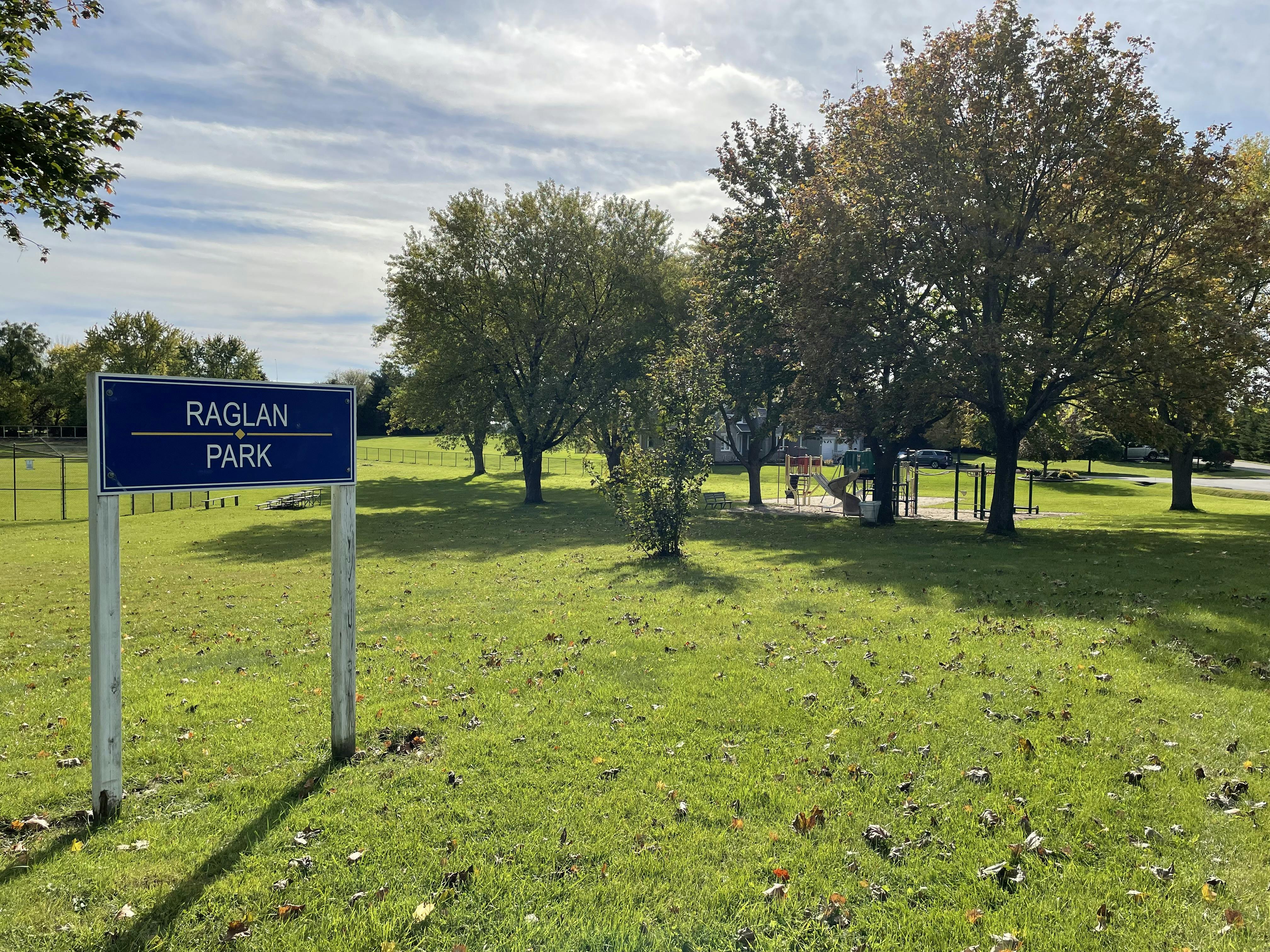 Existing Raglan Park sign with playground in the background