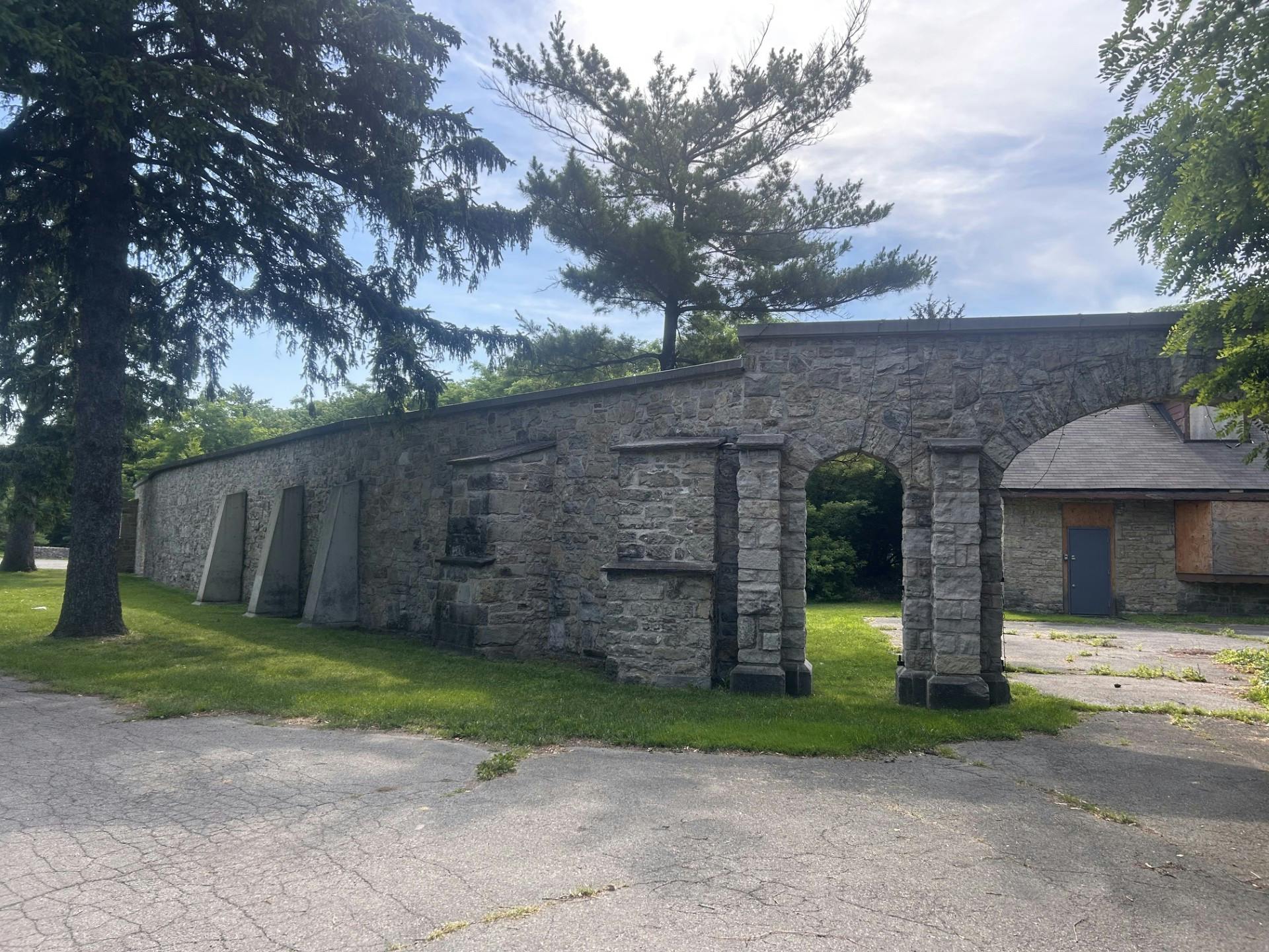 Coachhouse Exterior  from in front of Restored Stone Wall_View 1.jpg