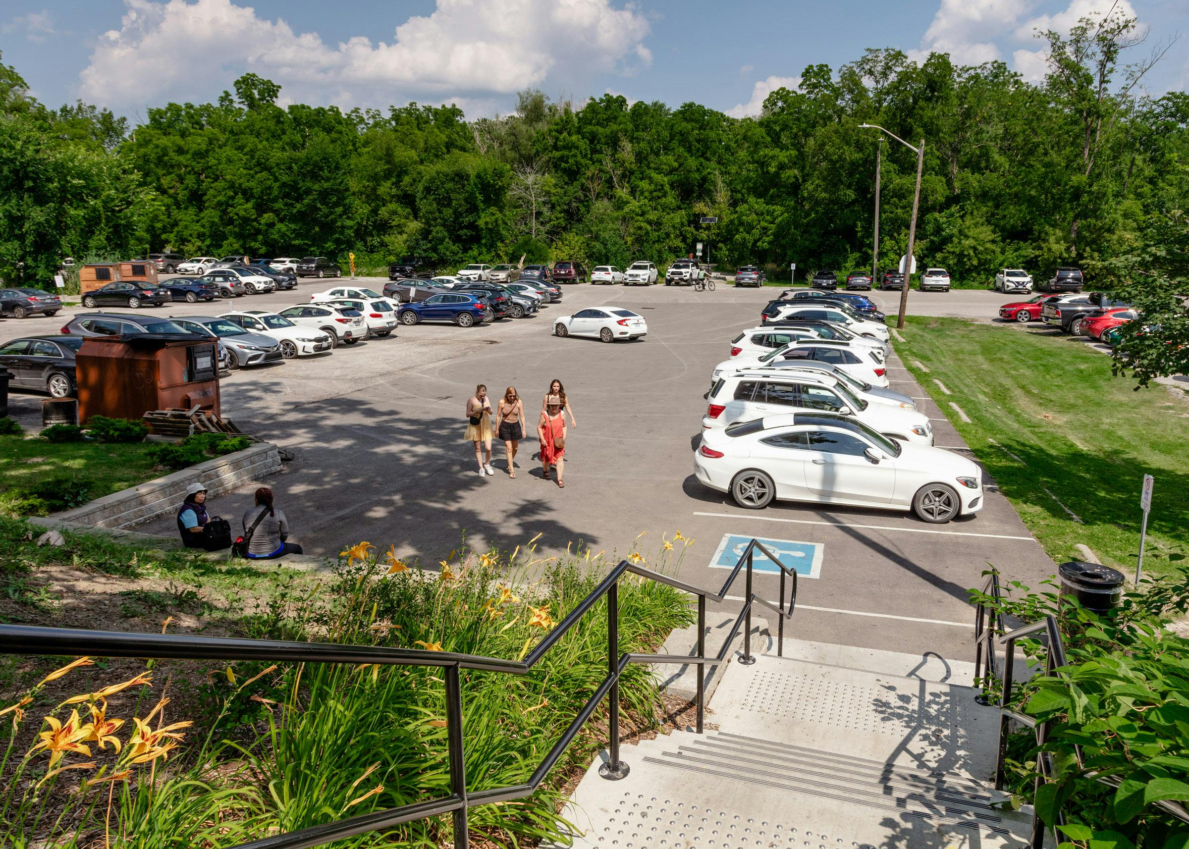 Pathway - The pathway to the Rouge Trail (Opportunity 2) begins at the bottom of the stairs and continues through the parking lot. Photo by Laura Findlay.